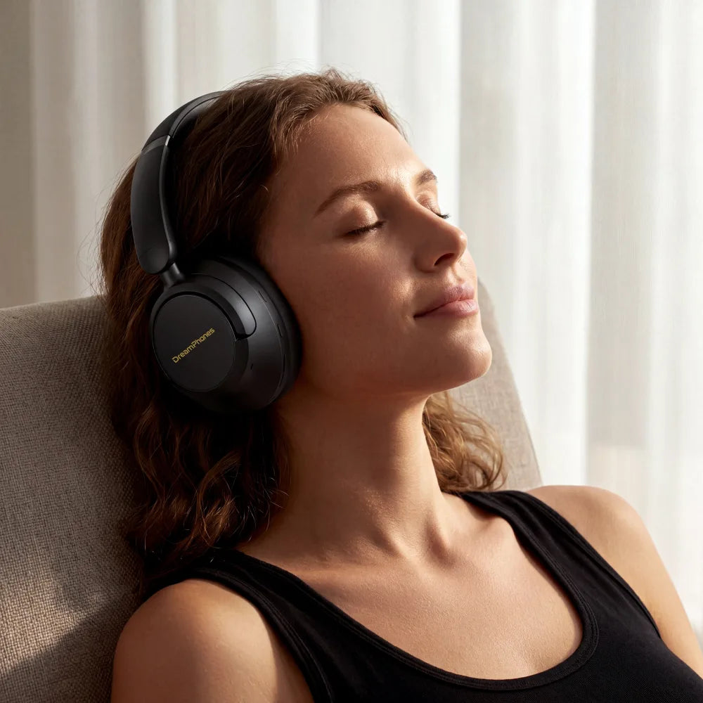 Woman seated and resting safely with DreamPhones